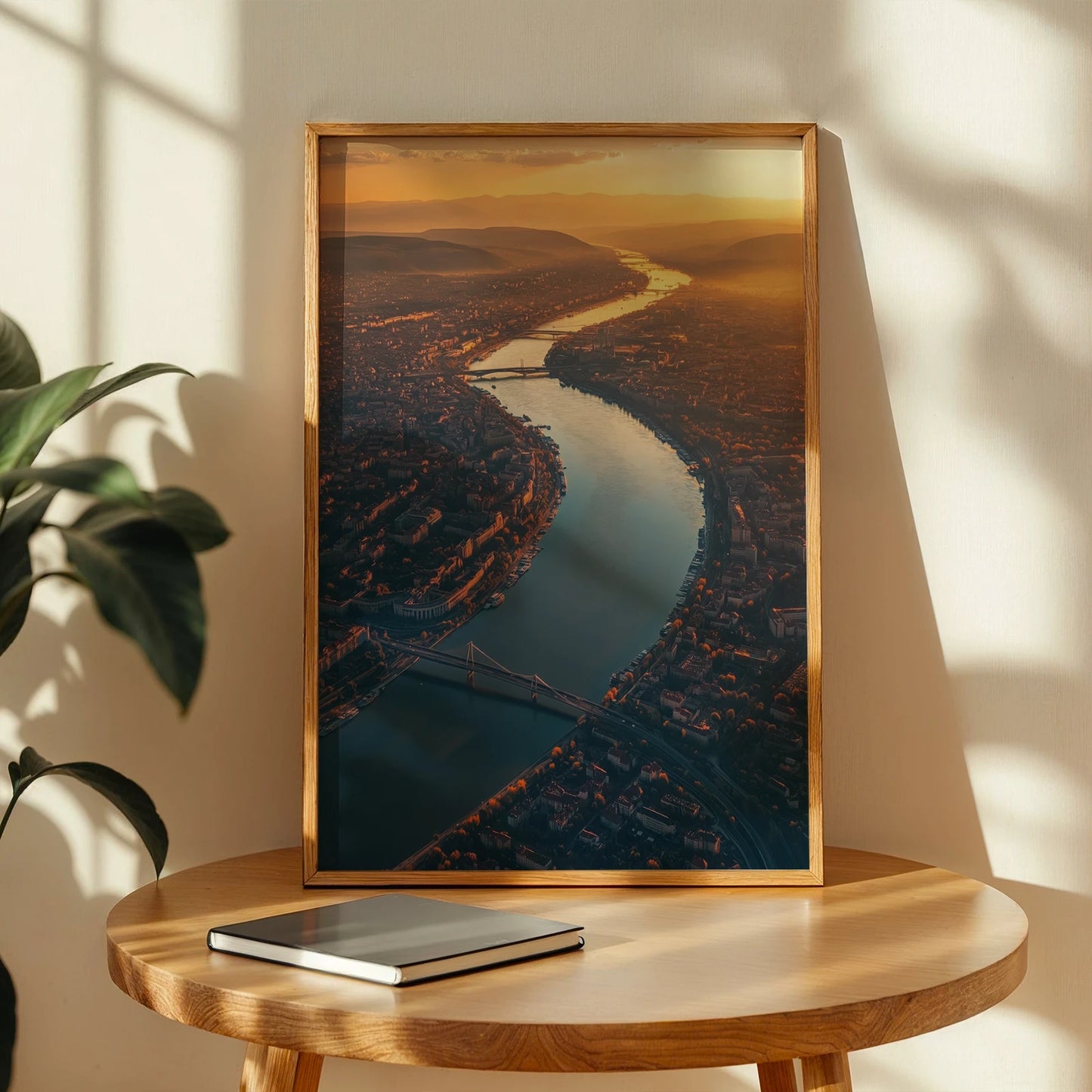 Warm aerial cityscape of Budapest river sunset travel print framed on a table