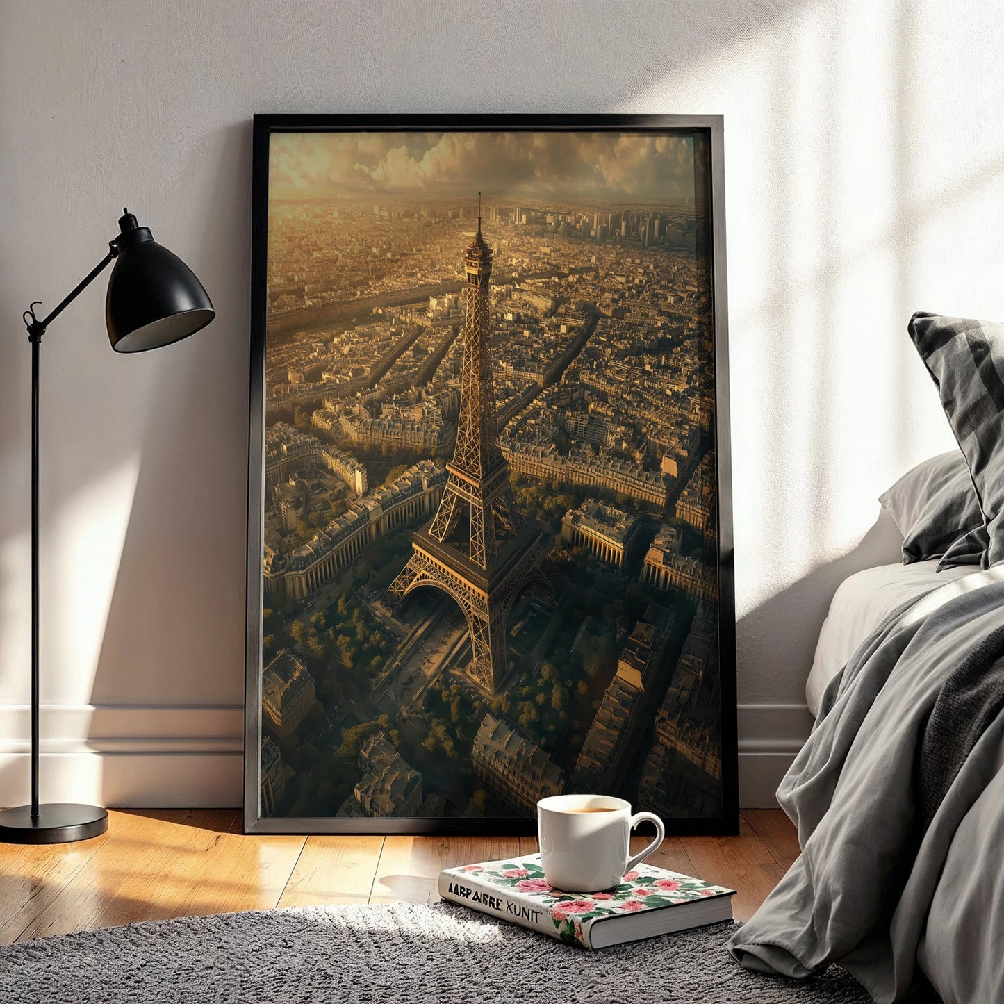 Close-up of Eiffel Tower wall art print in a bright living space, showcasing a Paris cityscape with rich, golden light.