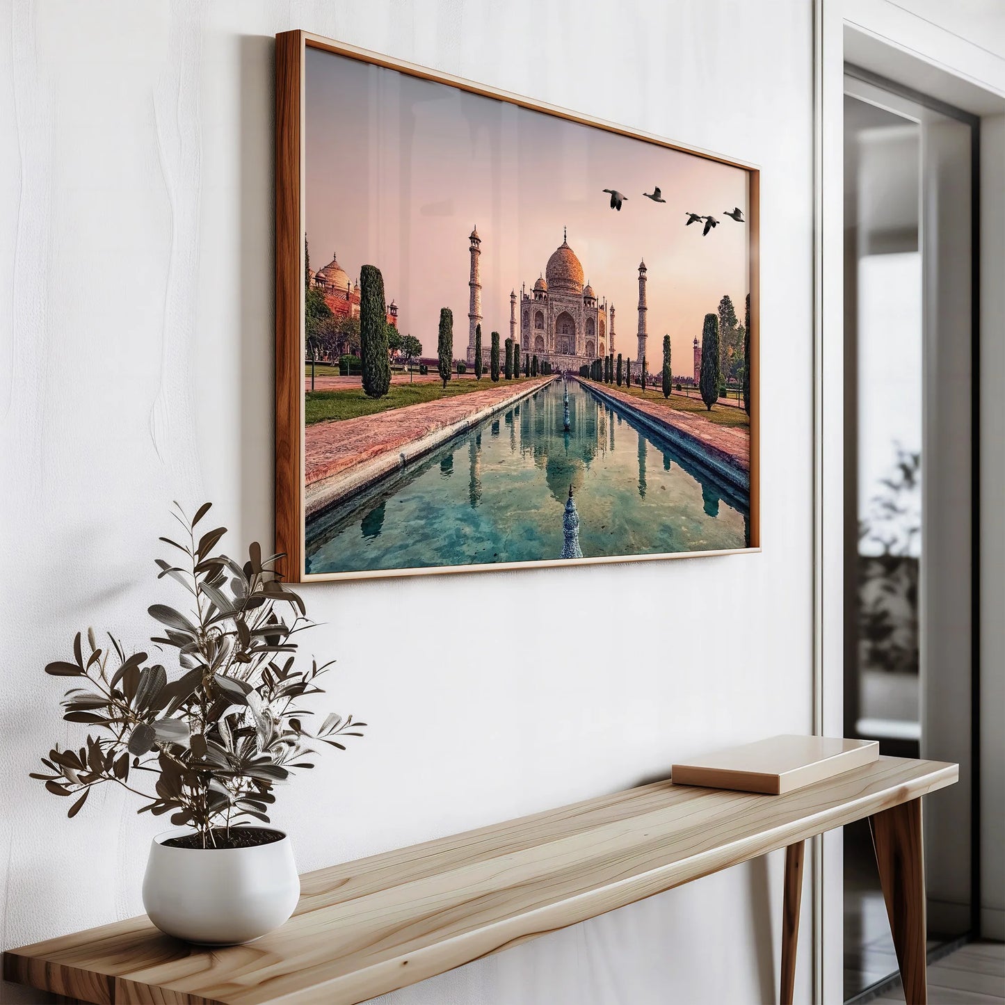 The Taj Mahal art print leaning against a wall, highlighting its ready-to-hang versatility.