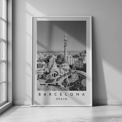 Striking black and white image of Park Güell's whimsical design, highlighting the blend of nature and architecture in Barcelona.
