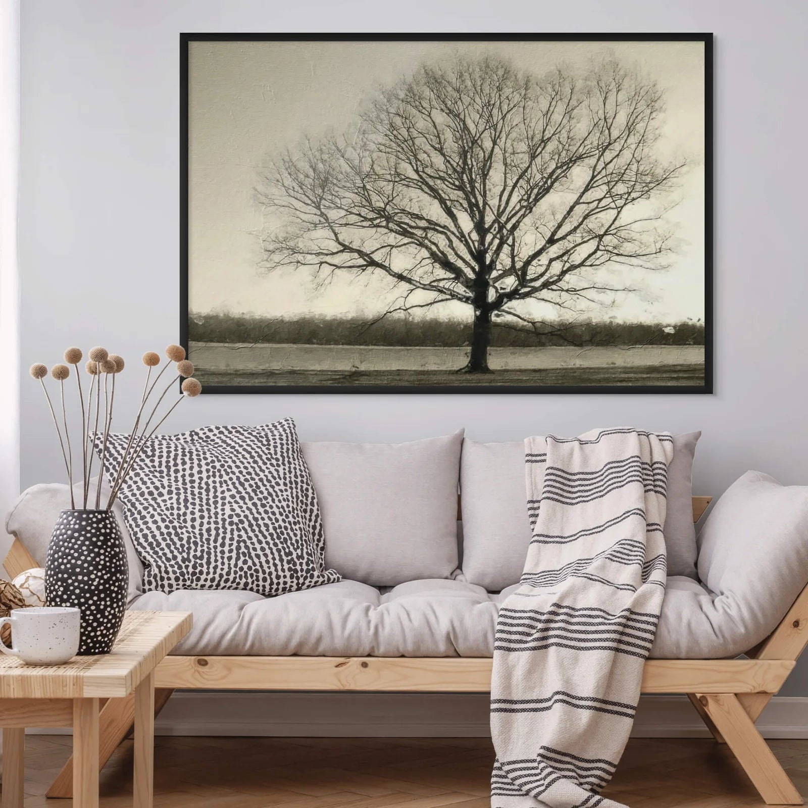 Dramatic bare tree print in monochromatic nature-inspired style.