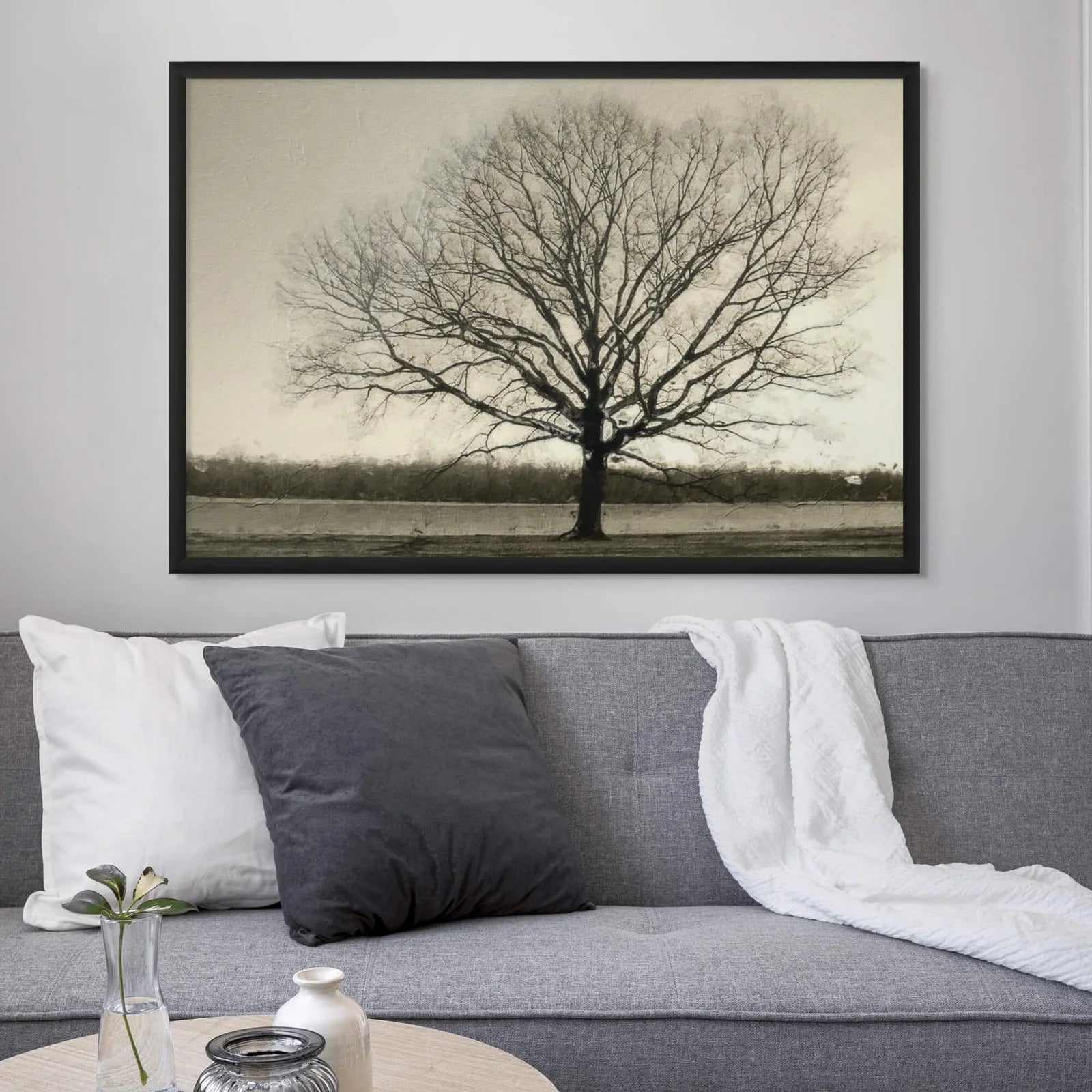 Monochrome tree winter sky art print in white frame.