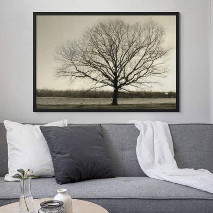 Monochrome tree winter sky art print in white frame.