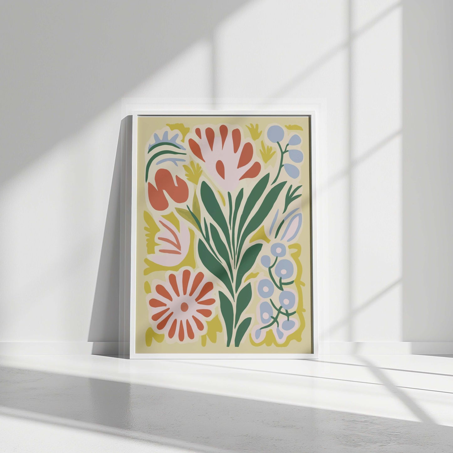 White-framed Blooming Harmony Print displayed in bright natural light, highlighting its vibrant details.
