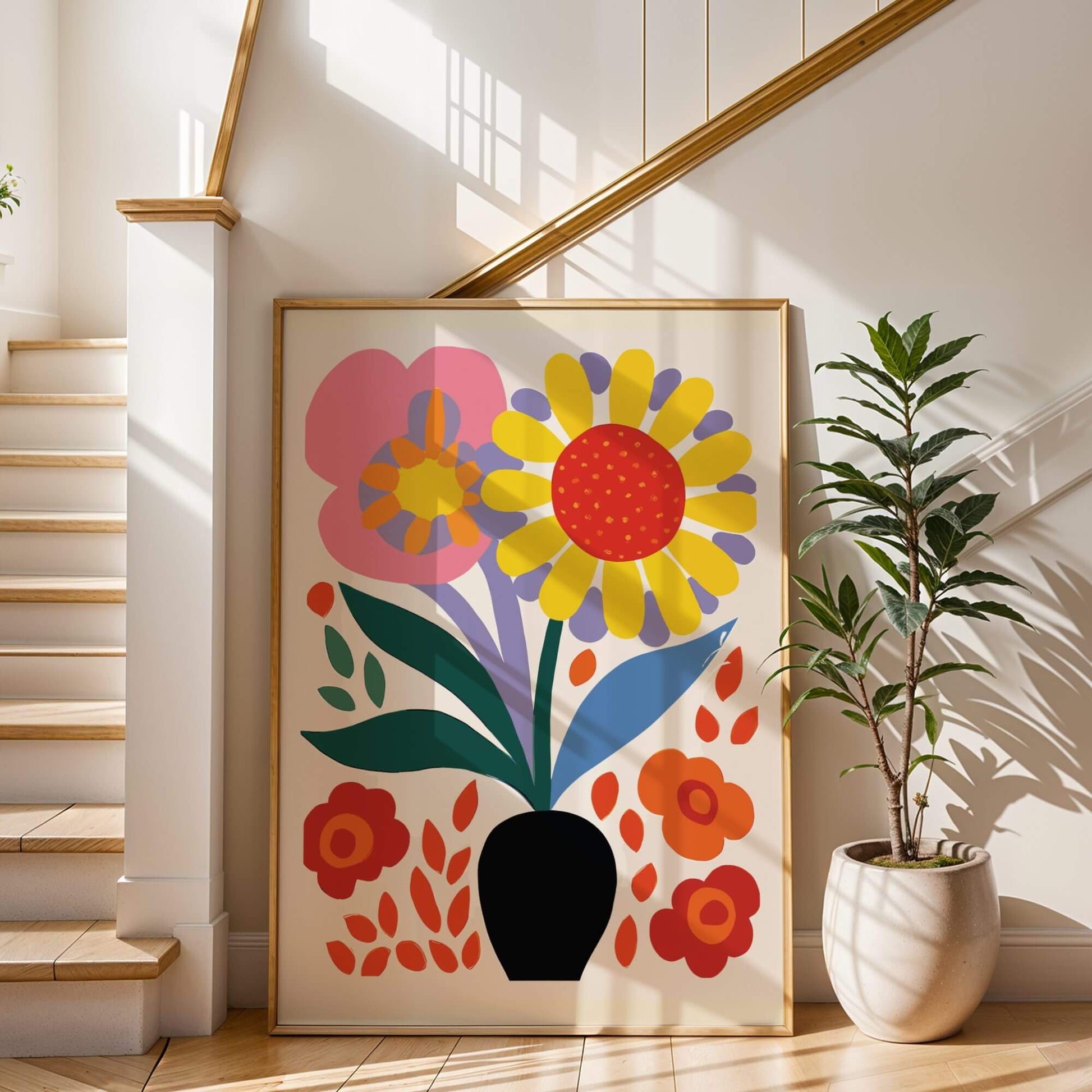 Large framed Bold Blooms Vase artwork leaning against a staircase wall, bathed in natural sunlight.
