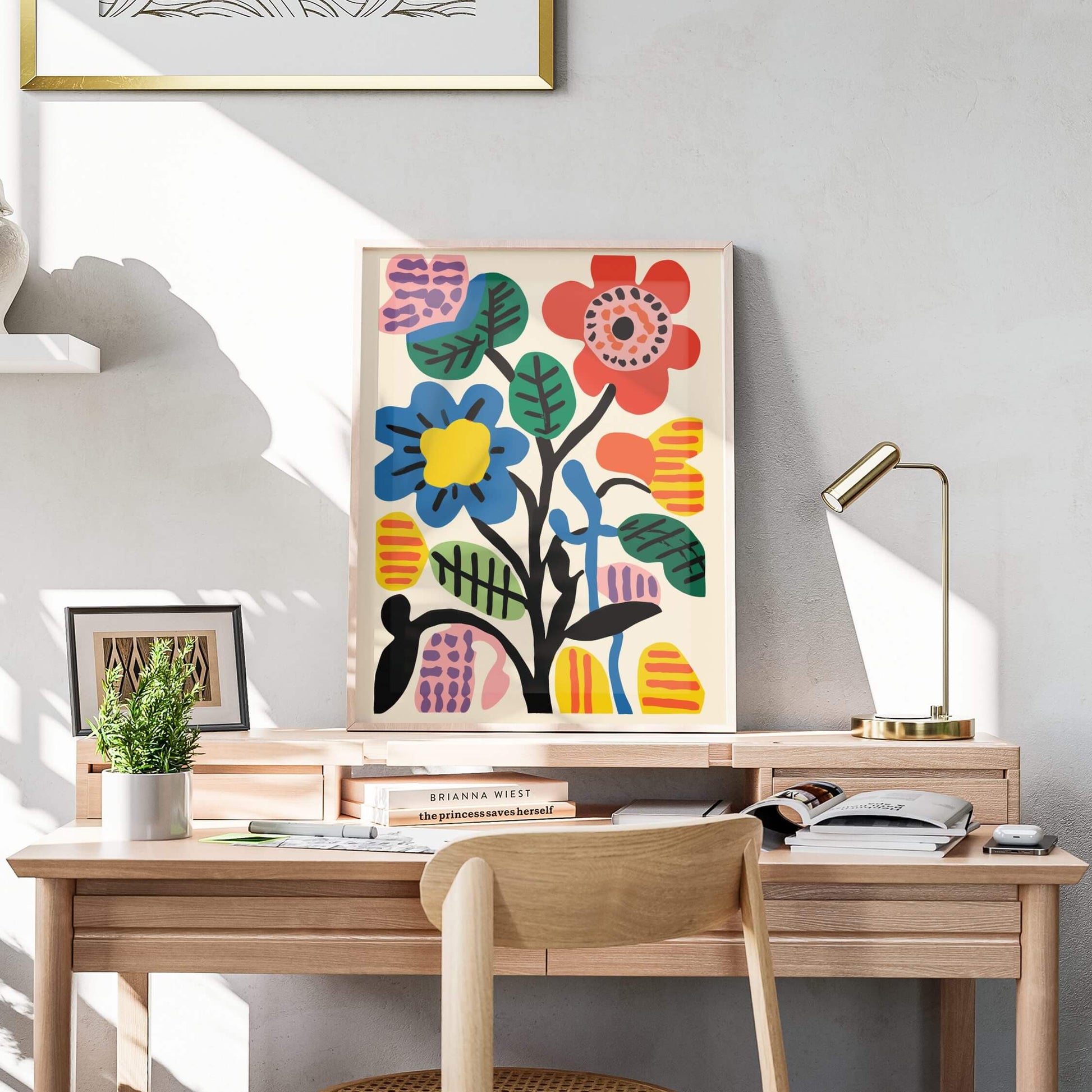 Bold Botanic Abstract floral print displayed elegantly on a wooden desk with natural sunlight.
