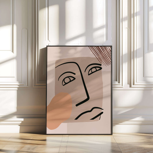 Ready-to-hang bold gaze abstract face art, framed in black, with dramatic shadows enhancing its sleek design.
