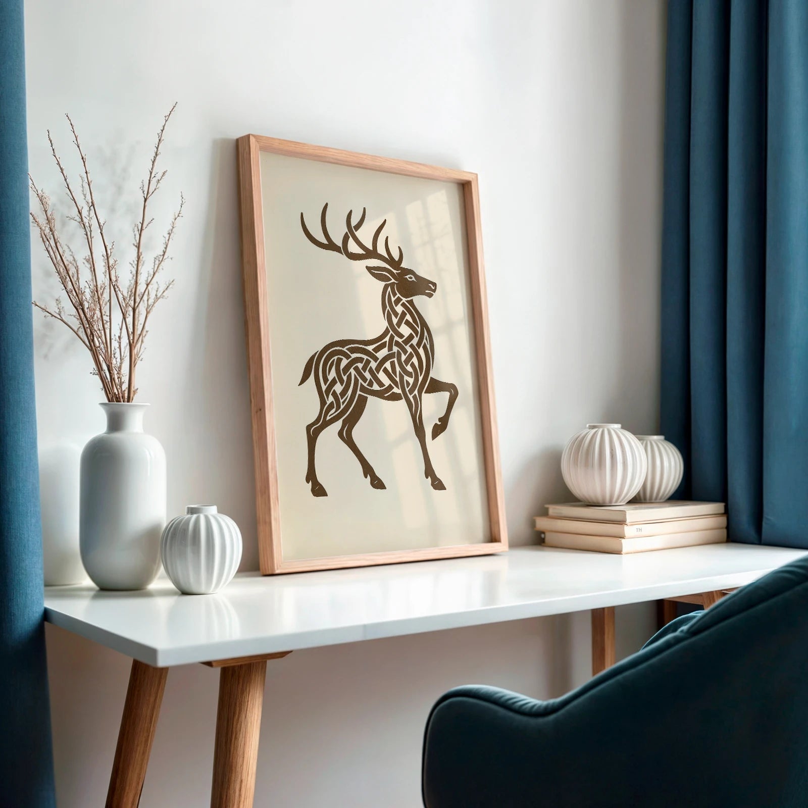 Celtic stag artwork with white table and blue curtains, natural light setting, nod to Celtic folklore.