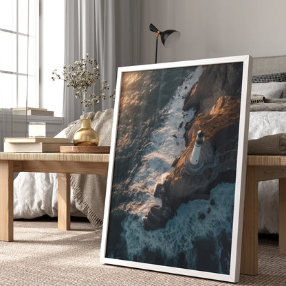 Dramatic ocean waves crashing against a cliff with a lighthouse overhead, travel wall print