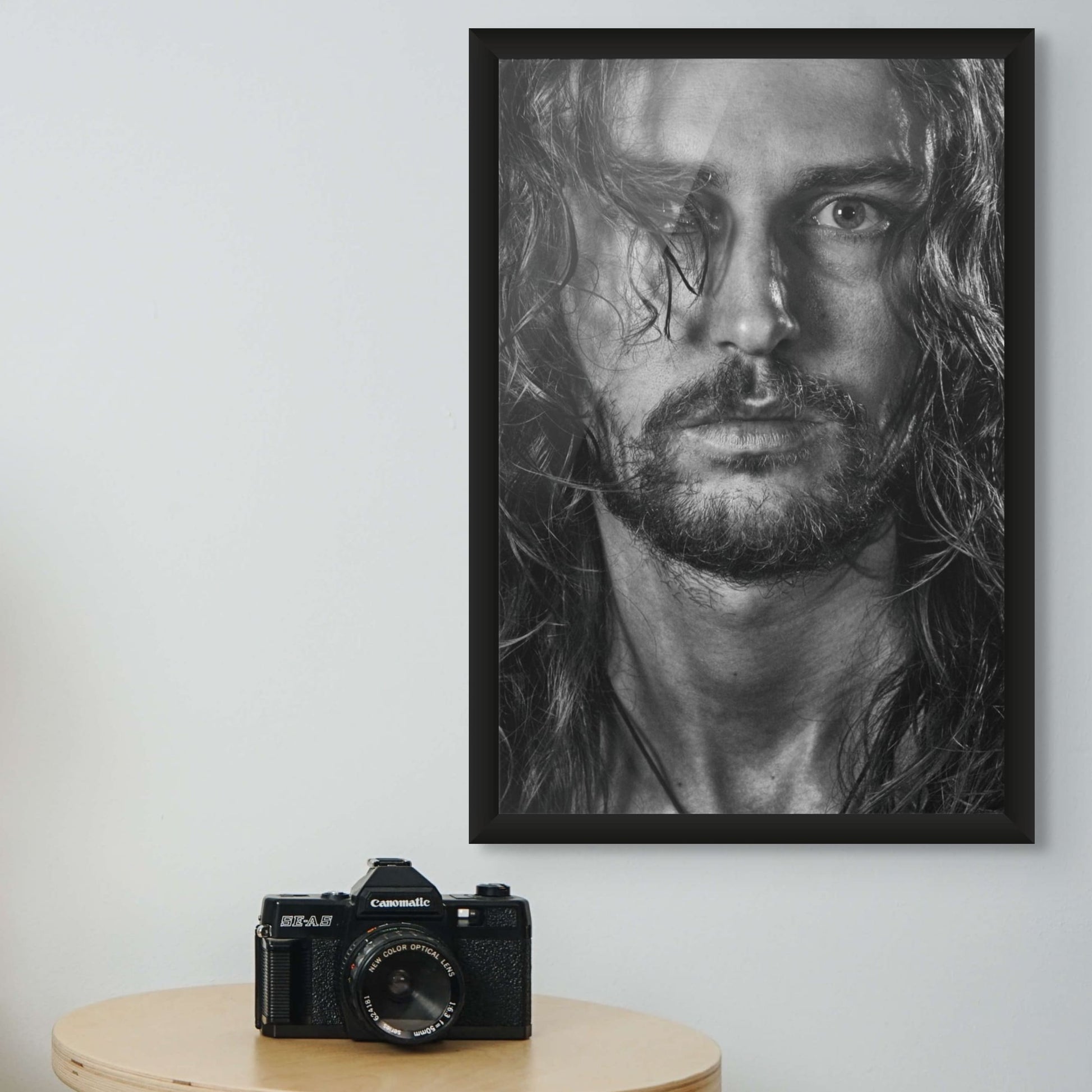 Black and white portrait with beard and necklace