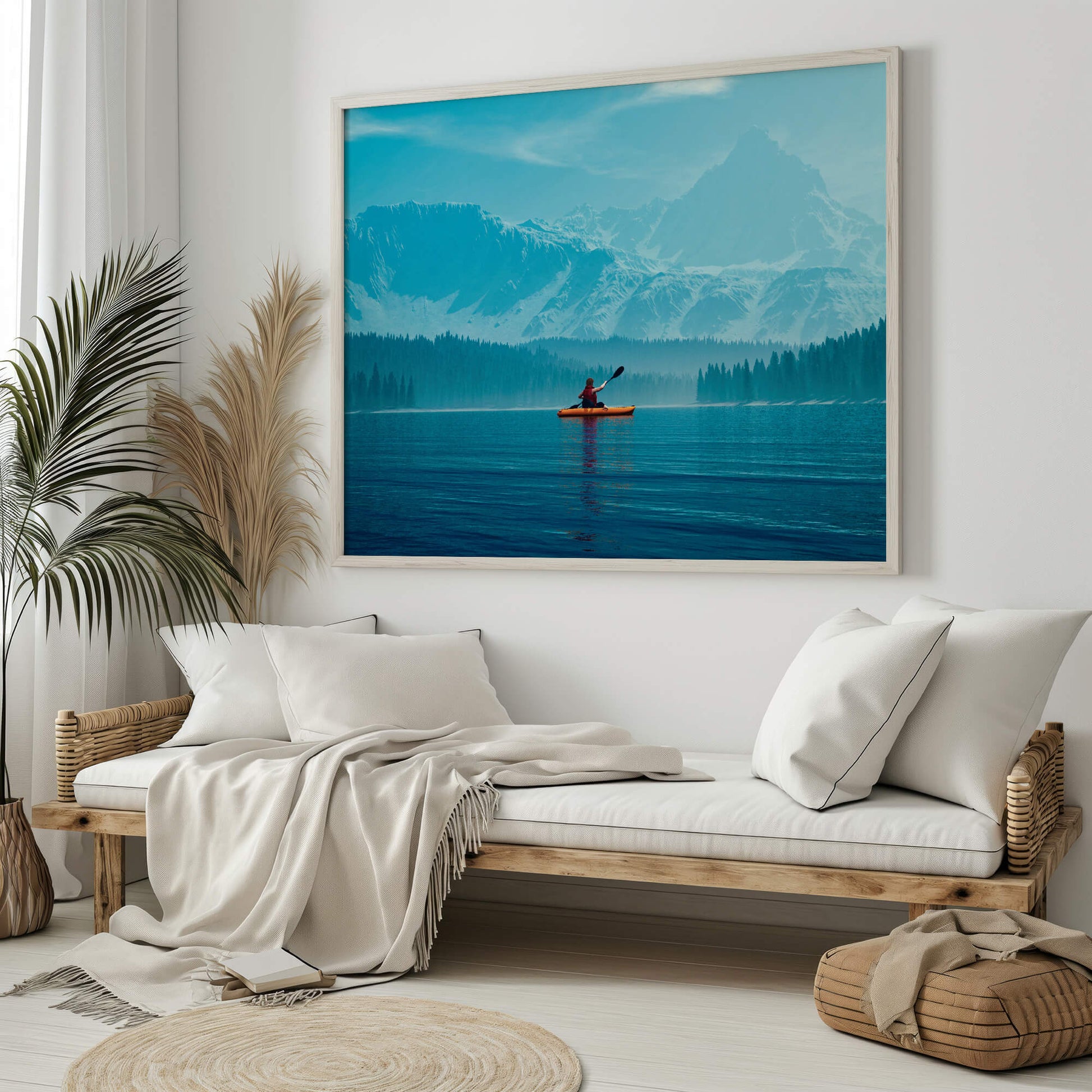 Framed kayak explorer print displayed in a modern, neutral-toned living room.
