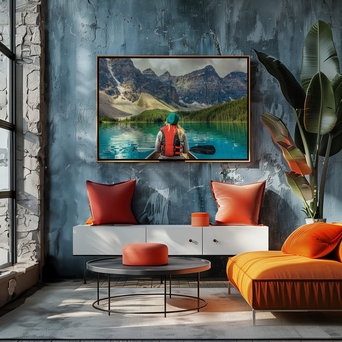 A contemporary decor setup featuring the Mountain Canoeing Print mounted on a textured wall.