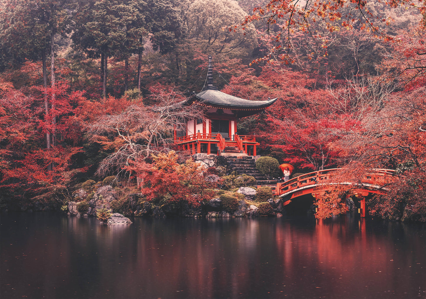 A striking wall art print of a Japanese temple reflected in a still pond, surrounded by vibrant red autumn foliage.