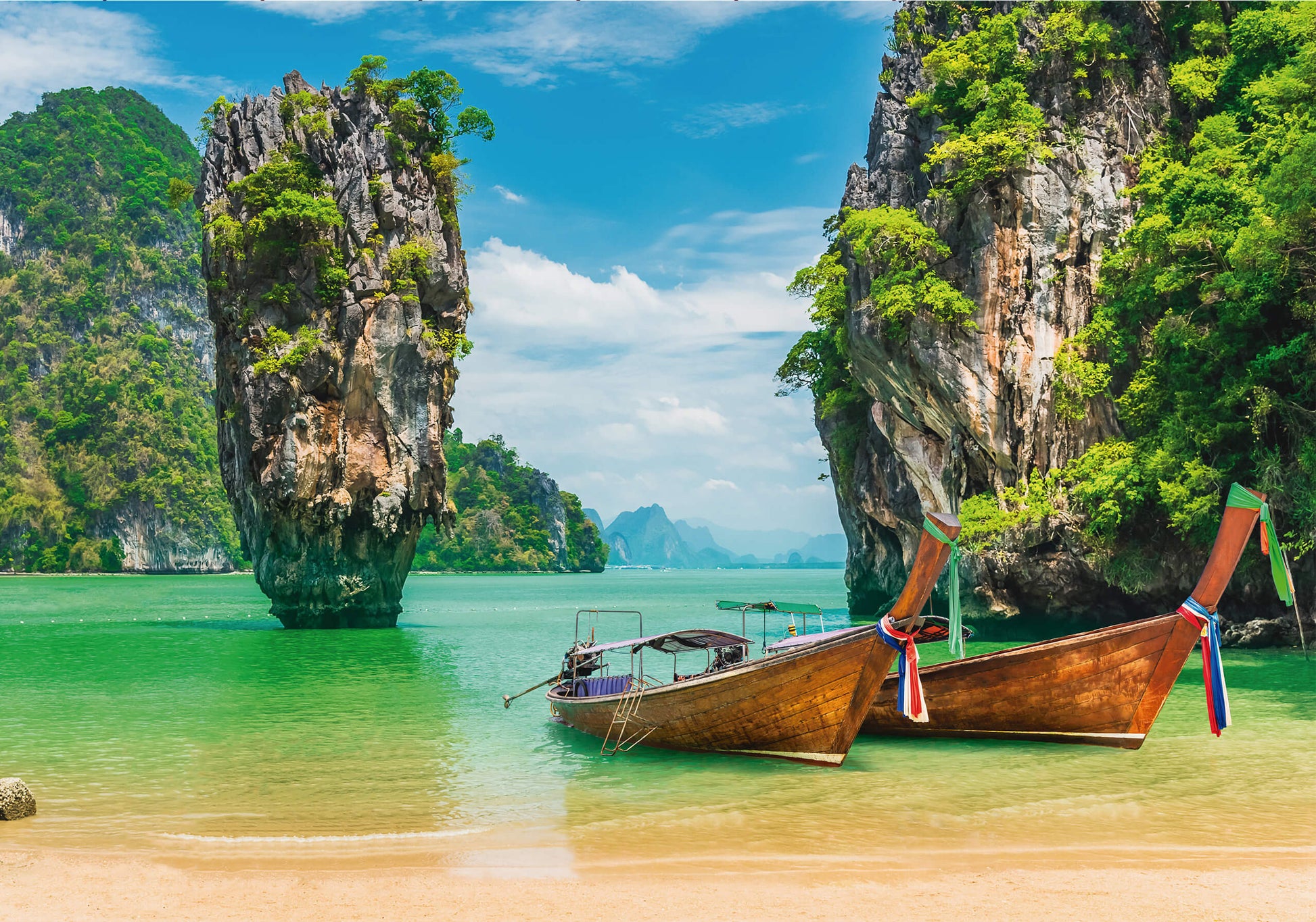 A stunning wall art print featuring traditional Thai longtail boats resting on a turquoise shore, with limestone cliffs in the background.