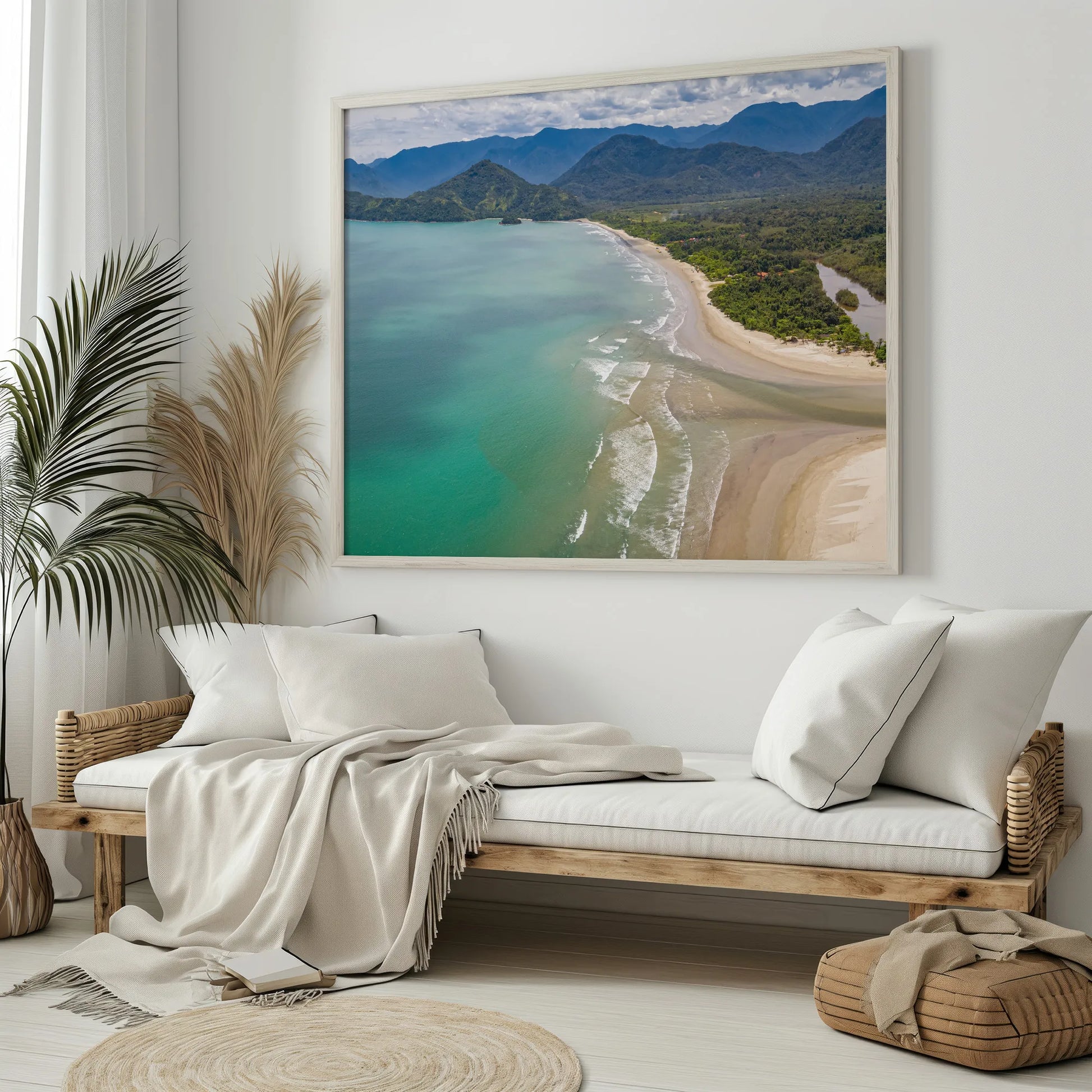 A minimalist setting with the Tropical Beach Print leaning against a white wall, ready to hang in any home.