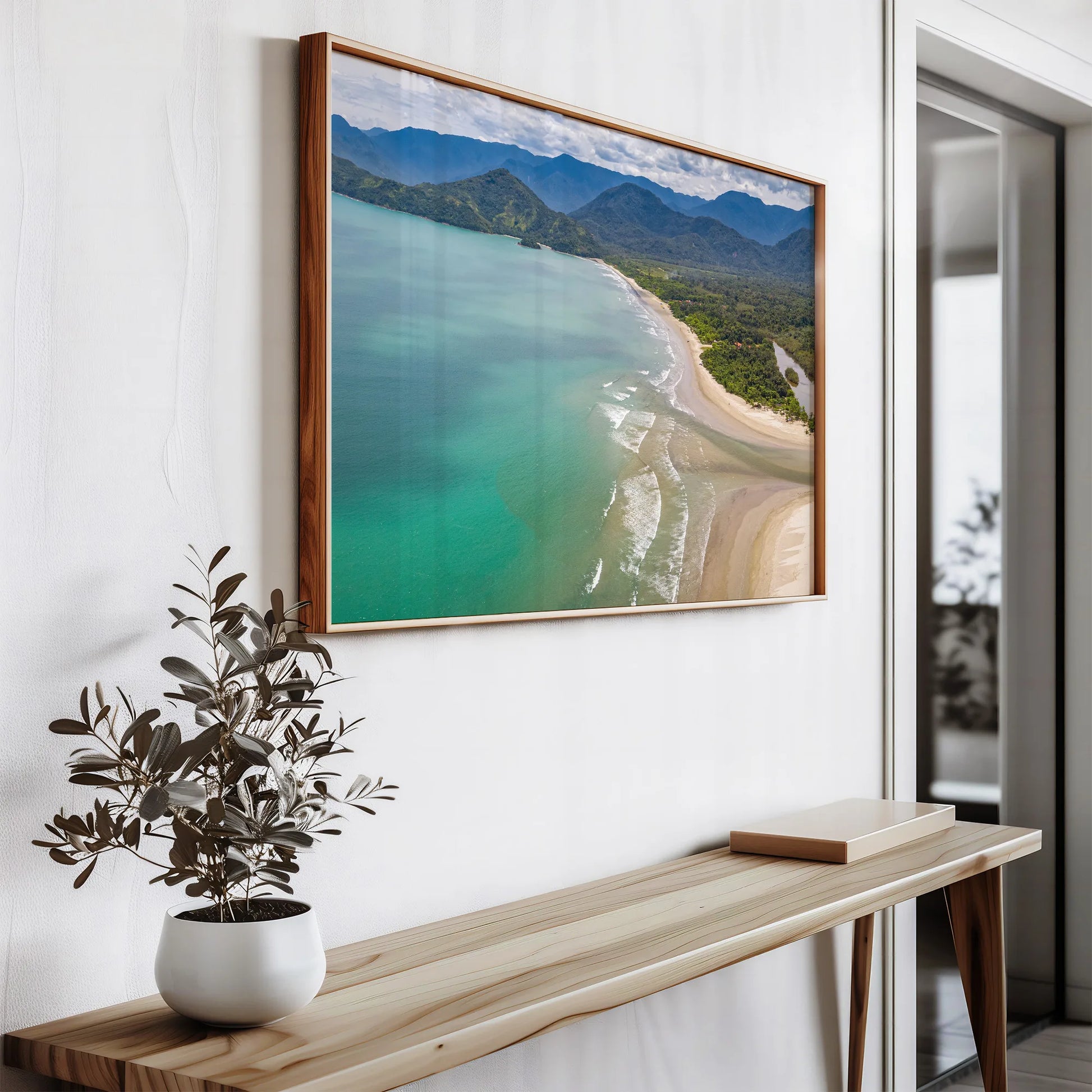 The Tropical Beach Print elegantly displayed in a cozy living room with neutral tones and natural wood accents.