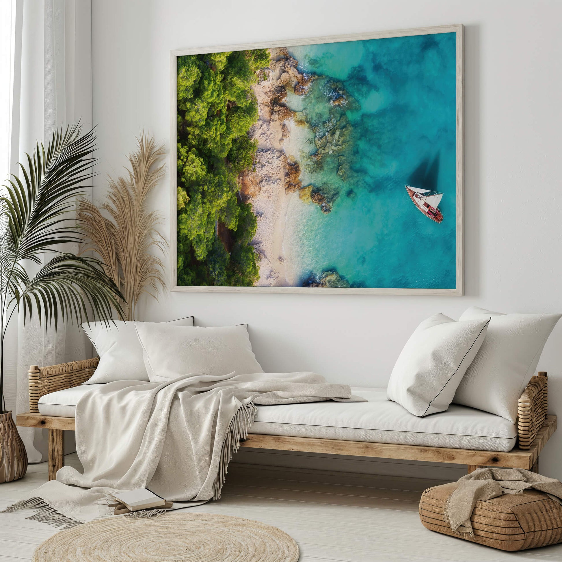 The Tropical Coastline Print displayed in a bright, airy living room, blending seamlessly with natural decor.