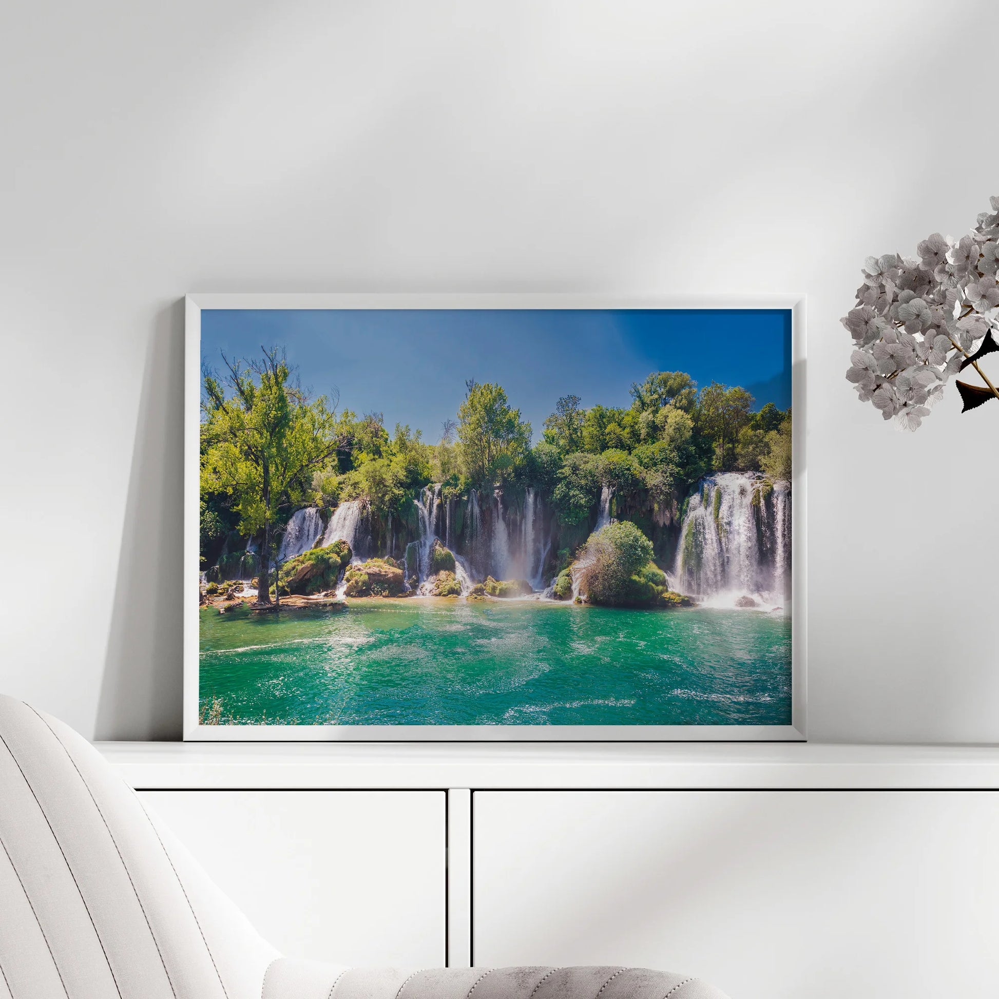 A close-up of the Waterfall Oasis Print, highlighting the intricate details of flowing water and natural scenery.