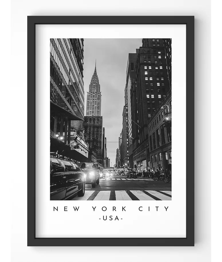 Classic black and white photograph of the New York City skyline featuring the Chrysler Building.