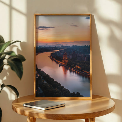 Evening cityscape reflection with a lit pagoda by the water, perfect travel décor