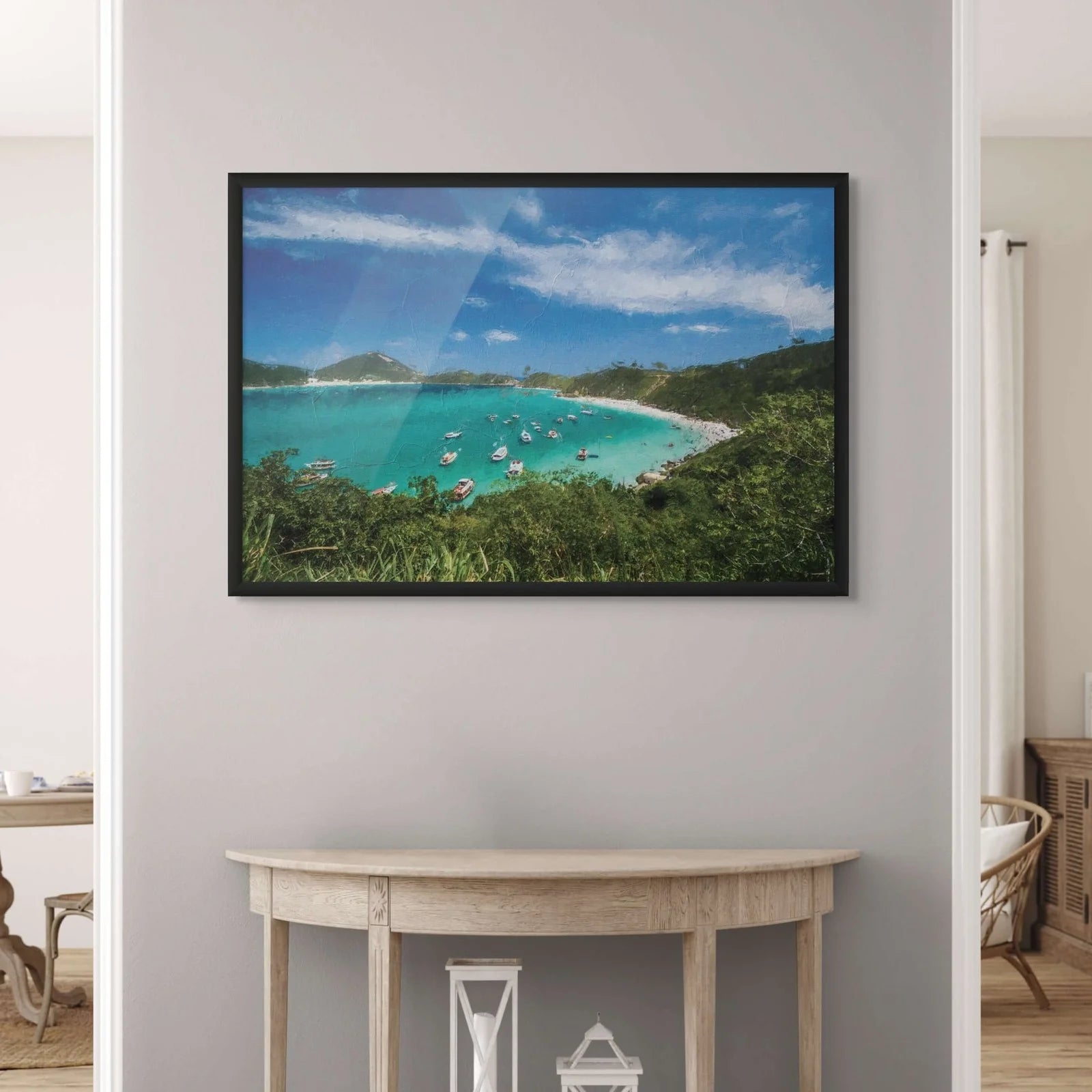 Black framed print of a tropical beach with turquoise waters adorned in a hallway wall.